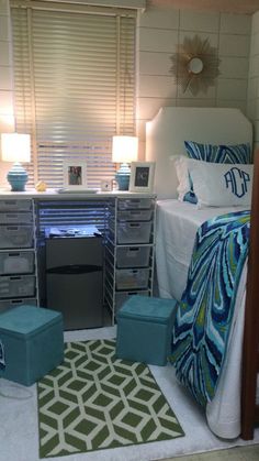 a bedroom with two twin beds and a desk