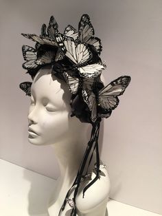 "Kentucky Derby -White & Black Fascinator- Butterfly Headpiece- Fashion shoot- Mad Hatter- Garden Party- Black & White Hi, This butterly and rhinestone headband/ fascinator is made with white and black feather butterflies that have rhinestones down its back...they are perched on black or white flowers. The flower is about 5\". The fascinator is on a matching ribbon covered headband that is adjustable to fit any head size and very comfortable. Will fit an 10 to 80 year old! Flower Colors: Bohemian Summer Party Hair Accessories, Bohemian Headpieces With Matching Headband For Party, Bohemian Party Headpieces With Matching Headband, Adjustable Headband For Summer Costume Party, Bohemian Summer Party Headband, Summer Party Bohemian Headband, Summer Bohemian Party Headband, Bohemian Headband For Spring, White Bohemian Headband