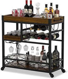 a bar cart filled with bottles and glasses