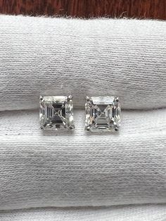 2Ct Asscher Cut Moissanite Stud Earrings in Push Back 14K White Gold Finish. Perfect for any occasion from Valentine's Day to Anniversaries, these earrings are a must-have for every jewelry collection. 💍✨ #MoissaniteStudEarrings #AsscherCut #WhiteGoldFinish #LuxeJewels #Fashion #JewelryAddict #Glamorous  #eBayStore #eBay #Asscher #Anniversary #MothersDay #Engagement #Wedding #Christening #Birthday Ascher Cut, Womens Earrings Studs, Asscher Cut Diamond, Asscher Diamond, Moissanite Engagement Ring Solitaire, Solitaire Earrings, Solitaire Studs, Heart Shaped Rings, Moissanite Earrings