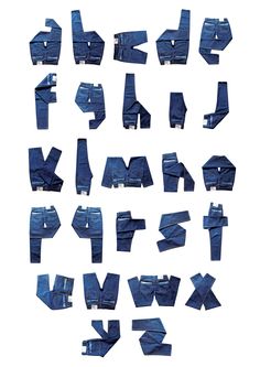 an alphabet made out of blue jeans on a white background