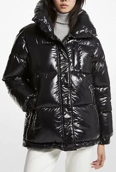 Stay cozy and stylish with this Michael Kors Women's Puffer Jacket in a glossy black color. The jacket features a hood, long sleeves, and a zip closure. It is made of high-quality microfiber fabric with a nylon lining and down insulation material to keep you warm in the winter season. Perfect for travel, casual wear, or business, this mid-length coat has a regular fit and comes in size L. The jacket's accents include a Michael Kors logo and a zipper. Its solid pattern and outdoor theme make it a versatile addition to your wardrobe. Get your hands on this new jacket without tags and step out in style. Black Ski Jacket, Puffer Jacket Women, Puffy Jacket, Down Coat, Black Bottoms, Padded Jacket, Ski Jacket, Puffer Coat, Jacket Style