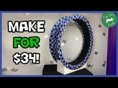 a blue and white wreath with the words make for $ 3 99 on it in front of