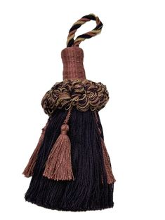 a brown and black tasselle hanging from a string