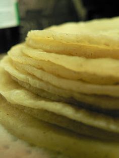 a stack of pancakes sitting on top of a counter