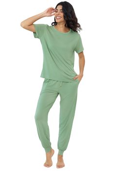 PRICES MAY VARY. 【VISCOSE FABRIC】Our jogger pajama set is made from 95% Viscose made from Bamboo and 5% spandex. Cooler than cotton, Softer than cotton, comfort than silk. 【ZERO RESTRAINTS】This Silky-Smooth Cooling Pajamas Set with excellent drape and elasticity is perfect for an easygoing, unrestrictive feel, fit a range of bodies, so you can unwind while looking your very best. 【CHIC DESIGN FEATURES】This soft pajama top features round neck, short sleeve.Pajamas pant feature adjustable drawstri Silk Joggers, Pajamas Short, Womens Pjs, Side Pants, Bamboo Pajamas, Soft Pajamas, Round Neck Top, Leg Design, Pajamas Set