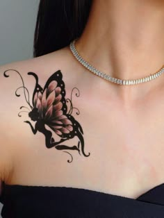 a woman with a butterfly tattoo on her chest