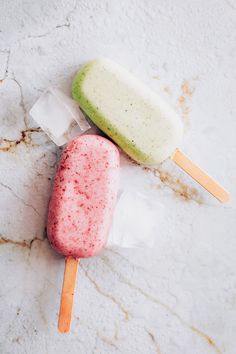 two popsicles sitting on top of each other