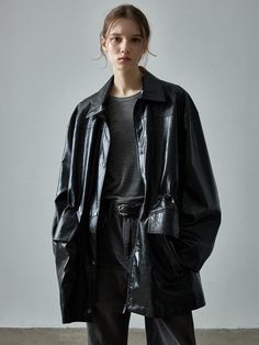 This leather utility jacket in a sleek black color offers a versatile addition to your wardrobe with its timeless style and practical features. It is characterized by the natural lambskin-like texture with a lightweight feel.- Oversized fit for comfortable wear experience- Seamless color for a classic look- Adjustable waist drawstring for a comfortable fit Sleek Oversized Winter Outerwear, Modern Oversized Leather Outerwear, Oversized Sleek Outerwear For Spring, Sleek Oversized Outerwear For Spring, Sleek Oversized Spring Outerwear, Modern Oversized Leather Jacket, Black Oversized Leather Jacket, Oversized Black Leather Jacket, Utility Jacket Outfit