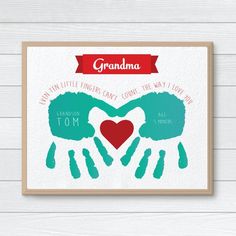 a card with two hands making a heart and the words grandma written in red on it