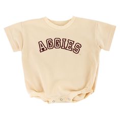 Look picture perfect in this stylish Cream Aggies Bubble Bodysuit! This cream bodysuit features "Aggies" in a maroon outline, making it the perfect choice for game day or for any special occasion. Make the most of your style and show your Aggie spirit! - Brand: Maxwell Monograms Baby First Birthday Themes, Cream Bodysuit, First Birthday Themes, Birthday Themes, Baby First Birthday, Baby Nursery, Game Day, Picture Perfect, Baby Onesies