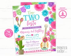 a pink and blue fiesta themed birthday party with flowers, guitars, and cactuses