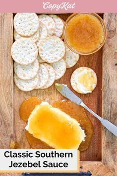 crackers and jam on a cutting board with the words classic southern jezebee sauce