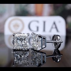 This dazzling GIA certified princess cut diamond stud earring carries a total weight of 4.00 carats. The diamond has been graded I color (extreme fire and shine) and VS1 Clarity. Sure to make any of your loved ones feel special and loved! Metal : Solid Platinum 950 Total Carat Weight : 4.00 Carats Type : Natural Genuine Diamond Shape : Princess Cut Carat Weight : 2.00 Ct. Each GIA Certified GIA Certification : Included, Contact us to obtain copy Approximate Measurement : 7x7 mm Cut : Excellent C Luxury Princess Cut Earrings, Luxury Princess Cut Earrings For Gift, Gia Certified Luxury Diamond Earrings, Luxury White Gold Princess Cut Diamond Earrings, Luxury Princess Cut White Gold Diamond Earrings, Luxury Princess Cut Diamond Earrings For Anniversary, Luxury Radiant Cut Diamond White Earrings, Luxury Diamond White Princess Cut Diamond Earrings, Luxury Princess Cut Diamond White Diamond Earrings