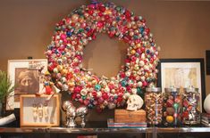 a christmas ornament wreath on top of a table