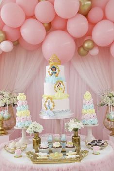 a princess themed birthday party with pink and gold balloons, cake, cupcakes and dessert table