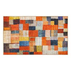 an orange and blue patchwork rug with squares on the bottom, in various colors