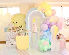 a room filled with lots of balloons and decorations