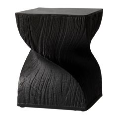 a black table that is made out of wood and has a curved design on the top