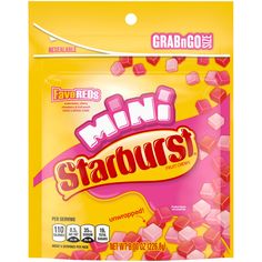 a bag of mini starbursts with pink cubes on the front and yellow background