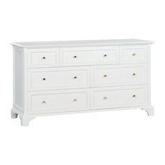 a white dresser with six drawers and gold knobs on the bottom, against a white background