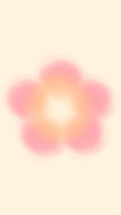 an orange and pink flower is in the middle of a white background with light coming through it