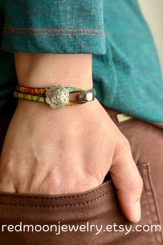 You'll love this fresh and unique approach to Western jewelry! A silver cuff style clasp with a stunning strip of color-streaked leather. The concho bead is the cherry on top! #westernjewelry #cowgirlchic #southweststyle #desertgems #redmoonjewelry Boho Leather Jewelry, Hippie Chic Fashion, Turquoise Bracelets, Handmade Boho Jewelry, Jewelry Colorful, Cuff Bracelets Handmade, Handmade Leather Bracelets, Hippie Bracelets, Red Moon