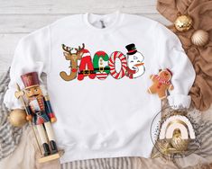 Personalized Christmas Name Sweatshirt, Kids Christmas Name Sweater, Kids Christmas Monogram Sweatshirt, Kids Toddler Christmas Sweatshirt Design is printed directly onto the shirt using Direct To Garment printer. The design is soft to touch. Shirts use to print are Premium quality brand. See picture for measurements & details. Kids Unisex Sweatshirt -8oz., 50% cotton, 50% polyester -1x1 ribbed collar, cuffs and waistband with spandex -Double needle stitching throughout -Pill-resistant air jet y Toddler Boy Christmas Sweater, Name Sweater, Name Sweatshirt, Birthday Gifts For Boyfriend Diy, Monogram Sweatshirt, Christmas Names, Christmas T Shirt Design, Sister Christmas, Christmas Monogram