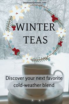 a coffee cup sitting in front of a window with the words winter teas on it