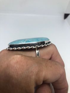 Large genuine aqua blue Larimar Vintage ring Low content silver not sterling. Size 9 Can be re sized at my jeweler. $10 All rings are shipped in a nice gift box. Check out our over a THOUSAND great reviews Engraving is $4 per letter and is not always perfect depending on the piece. It can take a few days if the jeweler is busy. This is payable to Paypal Judithsltd@gmail.com Collectible Round Turquoise Ring, Elegant Blue Larimar Turquoise Ring, Oval Blue Larimar Jewelry, Unique Blue Larimar Jewelry, Polished Turquoise Ring For Anniversary, Unique Larimar Turquoise Ring As Gift, Handmade Turquoise Larimar Rings, Turquoise Larimar Ring As Gift, Adjustable Blue Turquoise Ring Collectible