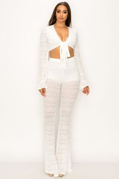 Look effortlessly amazing in the Vacay Vibes White Lace Crochet Wide Leg Jumpsuit. Perfect for any occasion, this stunning jumpsuit features a unique crochet pattern and a flattering wide leg fit. Add your favorite accessories to complete the look. Imported Lace Pull on closure Hand Wash/ Machine Wash Brand Size Dress Bust Waist Hip XS 0-2 31-32.5'' 23-24'' 31-34" S 4--6 33-35'' 25-26'' 35-37" M 8--10 35-36'' 27-28'' 38-39" L 12--14 38-40'' 29-31'' 40-42" XL 14-16 40-42'' 33.5-36'' 44-46" 2XL 18 White Wide Leg Jumpsuits And Rompers For Beach, Wide Leg Fitted Jumpsuits And Rompers For Beach, Fitted Wide Leg Jumpsuits And Rompers For Vacation, Fitted Wide-leg Jumpsuits And Rompers For Vacation, Vacay Vibes, Winter Knit Hats, White Jumpsuit, Lace Crochet, Boot Accessories