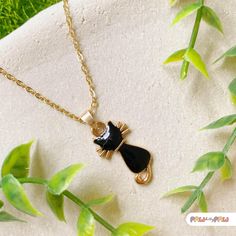 Hey cat lovers! 🐾 Our Minimalist Cat Necklace is here to add some purr-sonality to your outfit. Featuring kawaii Calico and Black Cat charms, this Neko Necklace is the purrfect gift for any cat lady. With a touch of Scandinavian elegance, it's the cat's meow in jewelry! Grab yours and feline fine! 🐱💕 🌸✨ Specifications ✨🌸 Pendant Size: Approximately 1 x 2 cm (0.4 x .8 inch) 🌸✨ Necklace Options ✨🌸 * A-18k Gold-Plated Chain Necklace - 40 cm (16 inches) * B-Black Cord Necklace - 40 cm (16 inc Black Cat Ears Jewelry As A Gift, Black Cat Ears Jewelry For Gifts, Cute Handmade Black Necklaces, Cute Handmade Black Necklace, Kawaii Black Jewelry Gift, Gifts Pink, Flower Choker Necklace, Flower Choker, Cat Pendant