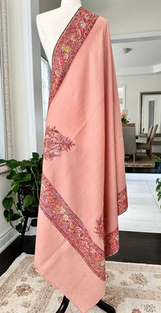 100% Hand-Embroidered Kashmiri Toosh Pashmina Shawl. Immerse yourself in the luxurious warmth and exquisite craftsmanship of this masterpiece. Painstakingly embroidered by skilled artisans, every intricate detail tells a tale of dedication and precision. Made from the finest Pashmina wool, this shawl embodies timeless elegance and sophistication. A perfect blend of heritage and luxury, it is a wearable work of art that adds a touch of opulence to any ensemble. Wrap yourself in the unmatched beau Luxury Wedding Embroidered Shawl, Luxury Embroidered Shawl For Weddings, Kashmiri Shawls, Pashmina Shawl, Shawl Scarf, Shawls And Wraps, Scarf Shawl, Scarf Wrap, Wedding Gift