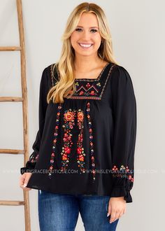 YOU'RE GOING TO LOVE THE EMBROIDERY DETAILS ON THIS TOP! Black Bodice w/ Red, Royal Blue, Golden Yellow, and Multicolored Print Square Neckline; Full Bishop Sleeves w/ Ruffle Trim; Curved Hemline Sheer Poly Feel; No Stretch; We Feel Fits True to Size We Recommend Wearing a Cami Underneath Bust Measured Laid Flat Across Front; Armpit to Armpit Small 19"; Medium 20"; Large 21"; 1XL 23"; 2XL 24"; 3XL 25" Length Measured Shoulder to Hemline Small 27"; Medium 28"; Large 28"; 1XL 29"; 2XL 30"; 3XL 30"