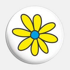 a yellow flower with blue center on a white button or pinback, front view