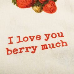 i love you berry munch embroidered on a white dish towel with red lettering and strawberries