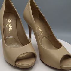 Chanel Lambskin Pearl Peep Toe Pump Beige 4.5" Heel Size 36.5 / 6.5 Chanel Open Toe, Chanel Two Tone Pumps, Cream Patent Leather Heels, Medium Width, Shoes Chanel, Chanel Shoes, Open Toe, Shoes Women Heels, Shoes Heels, Chanel