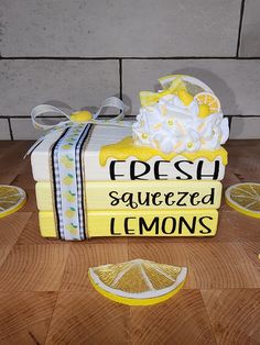 a cake made to look like lemons with the words fresh squeezed lemons on it