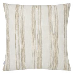 a beige and white striped pillow on a white background