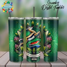 two green tumblers with straws in the shape of animals and plants on them