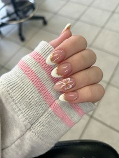 white and gold graduation nails with bow!! Gold And White Wedding Nails, French Tip Nails With Gold Accent, Nail Inspo Gold And White, White French Tip Nails With Gold Design, Acrylic Nails White And Gold, White And Gold Flower Nails, White Nails For Graduation, Gold Graduation Nails, White And Gold French Tips