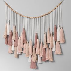 a group of tassels hanging on a wall