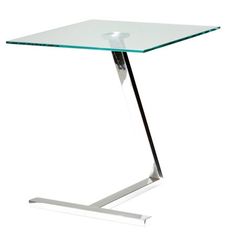 a glass table with metal legs on a white background