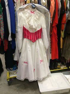 the dress is on display in the closet