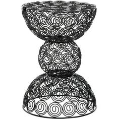 two black wire baskets stacked on top of each other in the shape of three circles