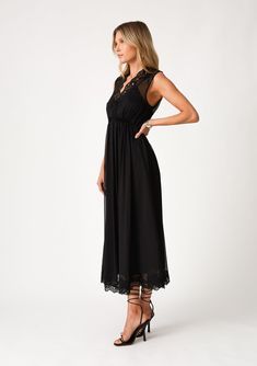 A classic black boho holiday dress with delicate lace detail. Chiffon Relaxed fit Sleeveless Midi length Lace trim Surplice v-neckline Half-smocked bodice at the back Open back detail with single button closure Empire waist Lined Bohemian holiday dress Delicate lace details add a pretty touch to this sophisticated holiday midi dress. Featuring a sexy surplice v-neckline and an open back detail with single-button closure. A versatile style for your next holiday party or date night, we love to pai Affordable Dresses With Button Closure For Date Night, Affordable Midi Length Sleeveless Dress For Date Night, Affordable Sleeveless Holiday Dress, Affordable Casual Midi Dress For Date Night, Affordable Casual Dress For Date Night, Affordable A-line Midi Dress With Button Closure, Boho Holiday Dress, Affordable Boho, Bohemian Holiday