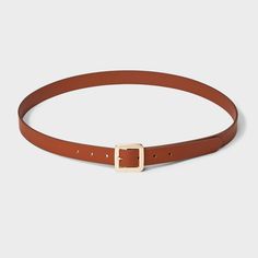 Instantly enhance any of your looks with this Chunky Center Bar Buckle Belt from A New Day™. This neutral tan belt offers easy styling with a range of outfits. It features a chunky square-shaped buckle closure for a touch of shine and chic style. This stylish women's belt with multiple holes provides an adjustable, secure fit around your waist. Whether paired with formal trousers or wrapped around the waist of a dress, this center bar belt lends on-trend flair to any outfit. A New Day™: Style th Trendy Brown Belt For Workwear, Casual Brown Belt For Workwear, Casual Brown Belt For Work, Brown Belts For Spring Workwear, Tan Belt, Women's Belt, Formal Trousers, Branded Belts, Of Outfits