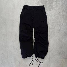 This is Nike Pants  Size S (6) *if you need measurements feel free to ask* is in very good condition. Item is clean and ready to wear. Standart shipping: USA - 10 days Europe 7-14 days Canada - Australia - 12-22 business days Price will be more to Winter Nylon Parachute Pants For Streetwear, Fitted Nylon Cargo Pants For Streetwear, 90s Style Nylon Sports Pants, 90s Nylon Parachute Pants For Streetwear, 90s Style Nylon Bottoms For Streetwear, Nike Gorpcore, Nike Hose, 90s Nike, Nike Pants