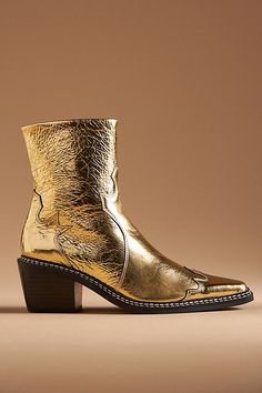 We've taken a shine to the Kylie boots by CAVERLEY. Perfect under jeans or alone, with a size zipper and 100% leather upper. | CAVERLY Kylie Western Ankle Boots by CAVERLEY in Gold, Women's, Size: 36, Leather/Rubber/Wood at Anthropologie Gold Cowboy Boots, 2024 Shoes, Gold Ankle Boots, Brown Cowgirl Boots, Gold Boots, Western Ankle Boots, Wood Heel, Rubber Wood, Shoes Booties