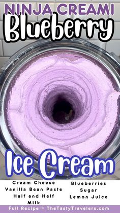 an ice cream cake with purple icing in a metal pan on top of a white tiled wall